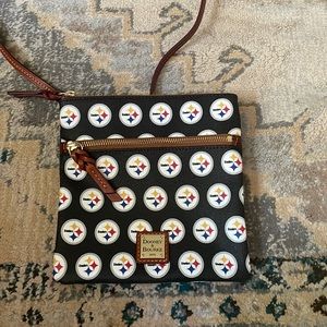 Brand new, NEVER USED! Dooney & Bourke Steelers double zip crossbody purse
